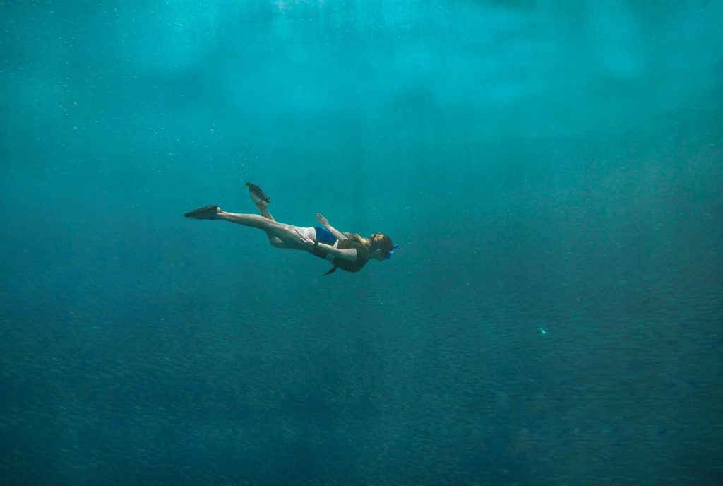 woman exploring diving sites in malaysia