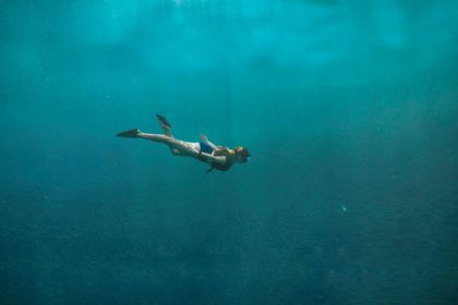 girl exploring one of the diving sites in malaysia