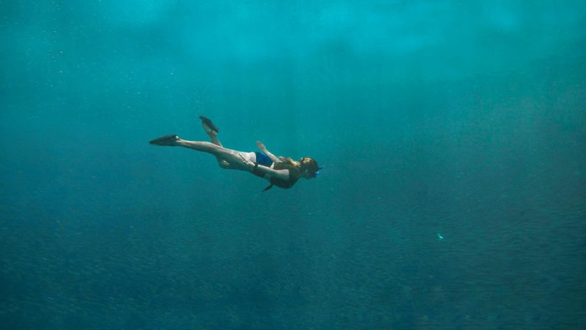 girl exploring one of the diving sites in malaysia