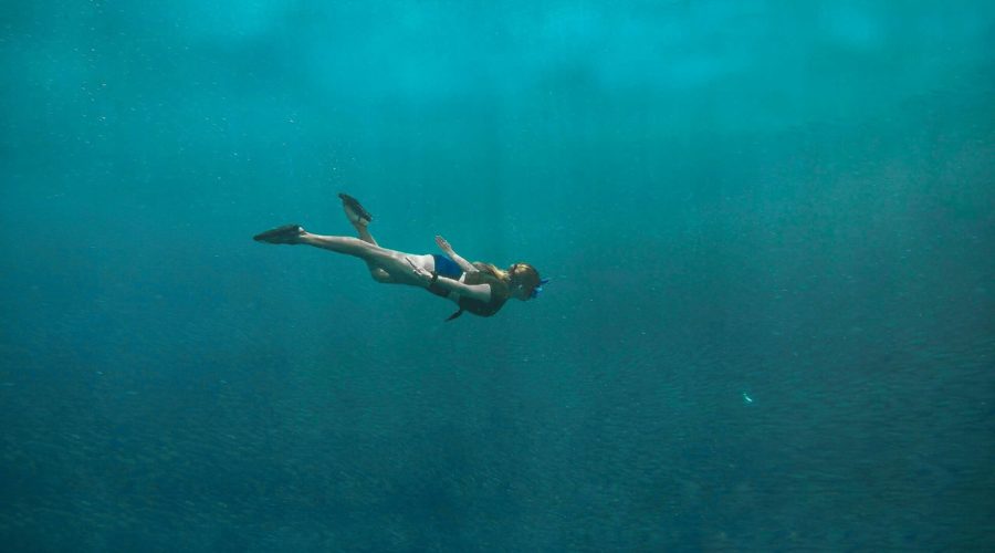 girl exploring one of the diving sites in malaysia