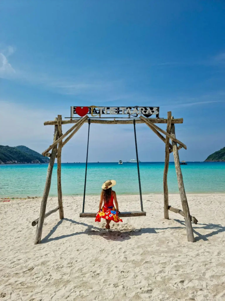 woman enjoying beach in redang, one of the best islands in malaysia