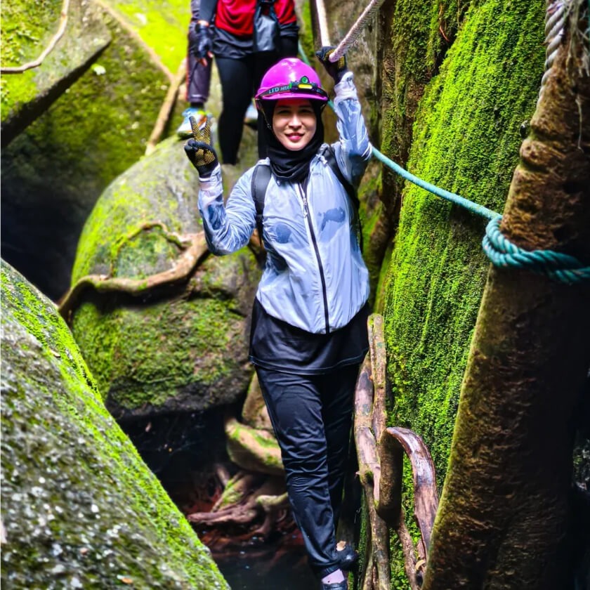 woman in gua batu maloi cave, one of the cool things to do in negeri sembilan